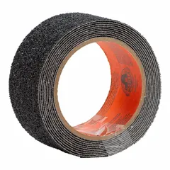 Solid black antislip tape with a grit abrasive surface for slip resistance in high-traffic areas. Made from PVC with a 0.1 in thickness, suitable for indoor and outdoor use on stairs, ramps, walkways, and industrial floors. Withstands foot traffic and equipment movement in wet or oily conditions.