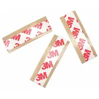 Double-sided tape strip with acrylic adhesive on a polyester film backing, 8.3 mil thick. Pre-cut to 3 in length and 3/4 in width. Used for mounting, splicing, and bonding in industrial assembly and maintenance applications