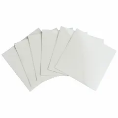 Clear polyester laminate sheet with permanent adhesive, measuring 2 1/2 in by 2 1/2 in. Applied over printed labels to protect against abrasion, chemicals, and moisture in industrial environments.