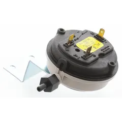 This pressure switch is a replacement HVACR control used to monitor and regulate refrigerant or air pressure in commercial heating, ventilation, air conditioning, and refrigeration systems. It opens or closes electrical contacts at preset pressure thresholds to protect equipment and ensure safe operation.