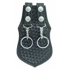 Leather key pouch with basket weave texture, measuring 5 inches by 115 mm. Features a snap closure and fits belts up to 2 1/4 inches wide. Suitable for carrying keys securely on a belt in industrial or tactical settings.