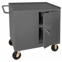 This fully assembled mobile cabinet bench is constructed of steel with a gray finish. It features shelves and a handle on the side for mobility. With an overall load capacity of 1200 lb, it is suited for use as a portable workstation and storage unit in industrial workshops, maintenance facilities, and assembly lines.
