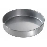 This 10-inch diameter round cake pan is constructed from aluminized steel with a glazed silver coating. The solid, non-perforated design and closed bead closure support even heat distribution during baking. Suitable for preparing round cakes in commercial or home kitchen environments