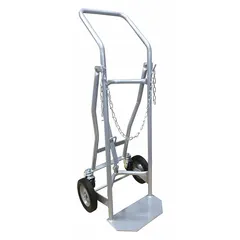 This Dayton standard cylinder hand truck is designed for transporting compressed gas cylinders and other cylindrical loads. It features a single flow-back handle, a 14 in wide by 7 in deep nose plate, and a chain securing mechanism. The silver finish provides a clean appearance for industrial use.