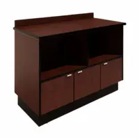 This microwave cabinet features a Blossom Cherrywood finish and three doors for convenient access. It includes leveling glides for stable placement on uneven floors. With a 46-inch overall width, it is suitable for housing a microwave in commercial kitchens, break rooms, or industrial cafeterias