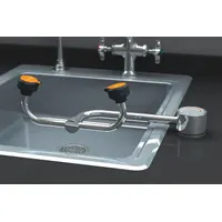 This plumbed counter-mount eyewash station provides eyes coverage for general-purpose use. It features swing-left activation and is designed for right-side counter-mount installation. Typical applications include laboratories, factories, and maintenance areas where emergency eye flushing is required