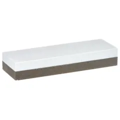 This dual-grit oilstone combines an Aluminum Oxide (India) side for coarse sharpening with a Soft Arkansas side for fine honing. Measuring 6 inches in length, 2 inches in width, and 1 inch in height, it is used for sharpening and honing cutting tools, knives, and chisels in machining and metalworking applications.