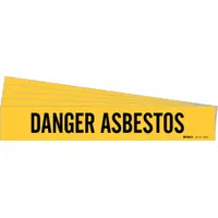Yellow adhesive pipe marker with black legend reading 'Danger Asbestos' for identifying asbestos-containing pipes. Fits pipe outer diameters from 2-1/2 to 7-7/8 inches. Pack of 5 markers without arrows. Suitable for industrial piping systems where hazard communication is required
