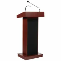 This mobile sound lectern features a laminate construction in mahogany finish. It includes a built-in amplifier, a document rail, and a battery for cordless operation. The unit supports clip-on, handheld, or mounted microphone configurations, suitable for presentations, speeches, and training sessions in conference rooms, classrooms, and similar venues