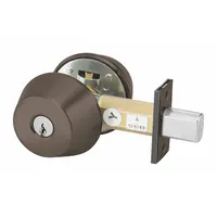 This standard cylindrical deadbolt features a Small Format Interchangeable Core (SFIC) cylinder with a Para keyway. It is designed for doors up to 1 3/8 in thick and comes in a Dark Oxidized Satin Bronze, Oil Rubbed finish. The lock includes the core and is ADA compliant. Suitable for commercial or institutional applications requiring quick rekeying