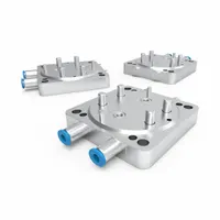 Tool mounting blank for UTC EOAT interfaces, size 80 x 80 x 10 mm. Connects universal grippers. Used in automated manufacturing and robotics for quick tool changes
