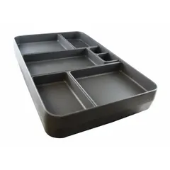 This CORTECH X-Tray features 7 compartments and is finished in dark gray. It measures 9 1/2 inches in overall width. Designed for use in correctional facilities, it provides a compartmentalized serving solution for institutional food service.