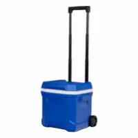 This IGLOO standard chest cooler has a 16-quart capacity, holds up to 24 cans, and provides 1-day ice retention. It includes wheels for portability and does not have a drain plug. Suitable for outdoor use, worksites, and events requiring portable cold storage