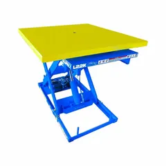 Hydraulic lift table with a 43-inch diameter rotating platform, 4,400 lb capacity, and 41 1/2-inch maximum lifting height. Operates on 115V AC. Used in material handling for raising, positioning, and rotating heavy loads in assembly, warehousing, and machine feeding applications.