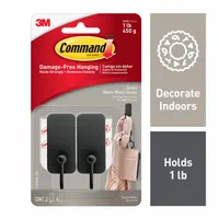 Indoor decorative and utility hook with adhesive backing for clean removal. Black finish, 1 point per hook, overall height 2 19/32 inches. Suitable for hanging lightweight items such as keys, small tools, or decorations