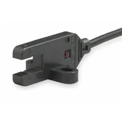 T-slot photoelectric sensor with PNP output and non-terminated cable, operating on 5-24V DC supply. Used for position sensing in pneumatic actuators and linear motion systems, detecting piston or target presence within T-slot cylinders for industrial automation feedback.