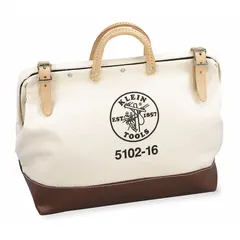This canvas wide-mouth tool bag from KLEIN TOOLS is designed for carrying and organizing hand tools, test instruments, and small parts on job sites. It features one exterior pocket and one inside pocket for convenient storage. The brown canvas construction provides a durable work bag for electricians, technicians, and maintenance professionals.