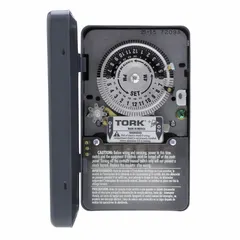 This TORK electromechanical timer switch provides 24-hour time-based control for lighting, HVAC, or equipment. It features a DPST contact rated for 120-277V AC and is housed in a metal body for indoor use. Suitable for panel or wall-mount installations in industrial control applications.