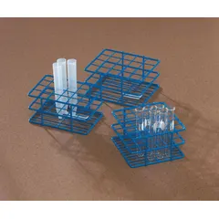 Benchtop test tube rack made of steel with a blue finish. Holds up to 20 test tubes securely. Overall dimensions: 4 1/4 in width, 3 1/4 in height, 5 in length. Suitable for organizing samples in laboratory settings.