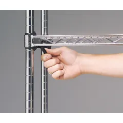 Plastic wedge sleeves for adjusting shelf positions on Super Erecta wire shelving systems. Each set includes four matte slate gray wedges that lock into posts to secure shelves at desired heights. Suitable for commercial kitchens, warehouses, and storage facilities.