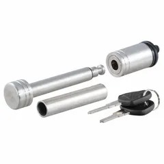 This receiver lock is constructed from stainless steel with a polished silver finish. It includes two keys and is used to secure trailer receivers, helping prevent theft or accidental detachment in towing applications.