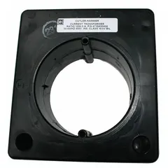 Panel mount current transformer kit with a 1500:5 ratio, featuring integrated lugs for secure electrical connections. Designed for metering and monitoring of electrical loads in industrial power distribution systems, stepping down high primary current to a safe 5 A secondary for instrumentation and control panels.