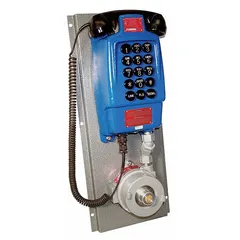 The P1021 is an intrinsically safe telephone for indoor commercial use in hazardous environments. It features a blue aluminum enclosure with corrosion-resistant properties, a ring detect relay, and a curly cord. Surface-mount, wall-mounted design for reliable voice communication in areas requiring explosion-proof equipment.