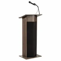 This stationary laminate sound lectern in Ribbonwood is 46 inches high and includes a battery, a handheld microphone sound system, and a document rail. It is suited for presentations, speeches, and training sessions in conference rooms, auditoriums, and houses of worship