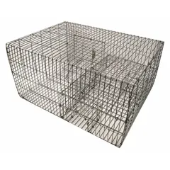 This stainless steel bird trap holds up to 12 birds and is designed for indoor or outdoor use. Birds enter through two doors and move to an elevated second level, which reduces distress calls. Suitable for capturing birds in various settings.