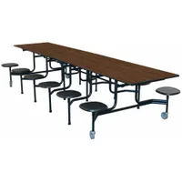 This bi-fold cafeteria table features a stool seat design with a rectangular laminate tabletop. The tabletop is constructed from industrial grade high pressure laminate over a particleboard core. With an overall height of 29 inches, it is suited for high-traffic dining areas such as school cafeterias and institutional food courts
