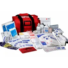 Red nylon duffel bag trauma kit containing 113 components: 48 adhesive fabric bandages, 8 nitrile exam gloves, 12 povidone-iodine infection control wipes, 2 trauma pads, and 1 emergency blanket. No oral or inhalant medications included. Suitable for emergency medical response in industrial, workplace, and field settings.