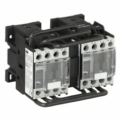 This reversing IEC contactor from Dayton has three poles and three normally open contacts, rated at 18 A with a 120V AC coil. It is used to control the direction of three-phase motors in applications such as conveyors, hoists, and pumps. Integrated surge suppression is not included.