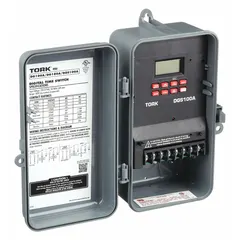 The TORK DGS100A is a digital timer switch with a 7-day programmable schedule, designed for outdoor use. It operates on 120-277V AC and features DPDT switching. The plastic body and surface mounting style make it suitable for controlling lighting, HVAC, or other electrical loads in outdoor applications such as parking lots and signage.