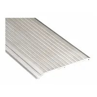 Saddle threshold made of aluminum alloy, 6 ft long, with a fluted transition type. Used to provide a low-profile transition between flooring surfaces at doorways in commercial or industrial settings