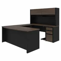 This U-shaped office desk from the Connexion Series features a laminate particle board construction in Antigua finish. Rated to ANSI/BIFMA standards, it provides a large work surface suitable for executive or managerial workspaces requiring ample room for multiple monitors and collaborative tasks