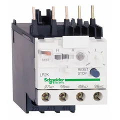 Three-pole IEC thermal overload relay with integrated bimetallic elements for motor protection. Features 1 normally open and 1 normally closed auxiliary contact, phase loss sensitivity, and screw clamp terminals. Signaling circuit rated up to 690V AC. Designed for use with TeSys K contactors in motor control applications.