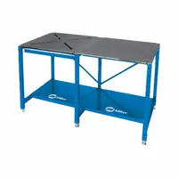 Fixed-height welding table with X Pattern work surface. Dimensions: 58 in width, 29 in depth, 35 in height. Provides a stable platform for positioning and securing workpieces during welding, fabrication, and assembly tasks