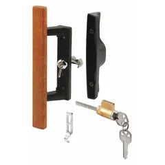 Recessed handle for sliding doors, measuring 9 inches in height and 2 inches in width. Provides a flush-mount locking solution for applications such as machine enclosures, equipment cabinets, and facility partitions. Suitable for industrial and commercial settings where a low-profile installation is required.