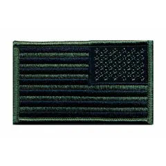 Embroidered emblem featuring a reverse U.S. Flag design in black and olive. Measures 3 3/8 in x 2 in, made of plastic with sew-on attachment. Suitable for uniform identification, tactical gear marking, or morale display on fabric surfaces.