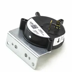 Replacement air pressure switch for HVACR systems. Monitors air pressure in ductwork or equipment to control system operation. Used in commercial HVAC units and rooftop systems.