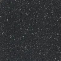 This vinyl composition tile (VCT) features a crown texture surface in Classic Black. Each tile measures 12 inches wide. Suitable for flooring in commercial and institutional spaces requiring a resilient, easy-to-maintain surface