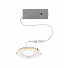 This low-profile canless downlight with integrated nightlight operates on 120V AC and delivers 650 lumens while consuming only 9.64W, replacing a 60W incandescent. It features selectable color temperatures of 2700K, 3000K, 3500K, 4000K, and 5000K, and is fully dimmable. The white trim and compact design make it suitable for residential and commercial recessed lighting applications such as hallways, kitchens, and bathrooms.
