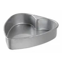 Straight side cake pan made of aluminized steel with a glazed coating and closed bead closure. 26 ga gauge construction. Suitable for baking heart-shaped cakes in commercial and home kitchens