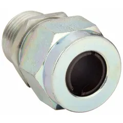 Straight metallic cable grip with steel body and 1/2 in MNPT box connection. Accommodates cord diameters from 0.50 in to 0.63 in. Features brown color-coded grommet. Rated IP66 and Class I, Division 2 for hazardous locations. Used to secure and seal electrical cords entering junction boxes or enclosures in industrial environments.