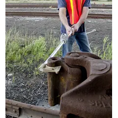 This telescoping brake stick is used for manually applying or releasing hand brakes on railcars. Its adjustable length extends up to 81 inches, allowing operators to operate from a safe distance. The tool provides reach and leverage for railway brake applications.