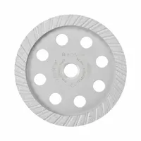 This 5-inch diameter turbo diamond cup grinding wheel features 5 segments and a 5/8-inch-11 arbor. It is designed for aggressive material removal and shaping on concrete, masonry, and stone surfaces in construction and masonry applications