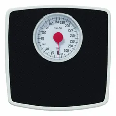 Analog dial bathroom scale weighing in pounds. Includes a black mat for comfort and stability. Weighing surface measures 11 1/2 inches wide by 10 13/16 inches deep. Suitable for personal weight measurement in home or light commercial settings.