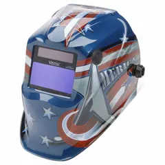 Auto-darkening welding helmet with American Flag graphic in blue, red, and white. Features digital ADF controls with welding shades W7-W13, 3.78 x 1.85 in viewing area, grind mode, ratchet suspension adjustment, and proprietary nylon shell. Suitable for arc welding processes such as MIG, TIG, and stick welding.