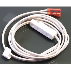 Room temperature sensor for HVACR systems, used to monitor ambient temperature for defrost cycle control. Signals when defrosting is needed to optimize system efficiency. Commonly applied in commercial refrigeration and heat pump units.