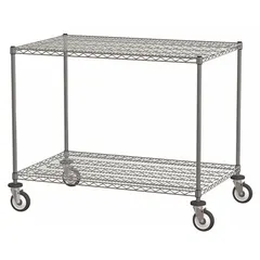 Mobile wire shelving unit for dry storage applications. Silver finish with chrome posts and two round steel shelves. Includes four swivel casters with polyurethane wheels for easy repositioning. Split sleeve design allows tool-free assembly.